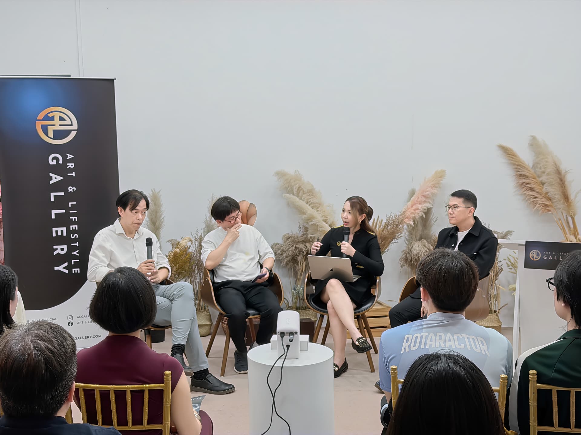 Yeo Eng Peng replying to the question about AI with Angelo Chia, Dabby Wong and Alex Leong