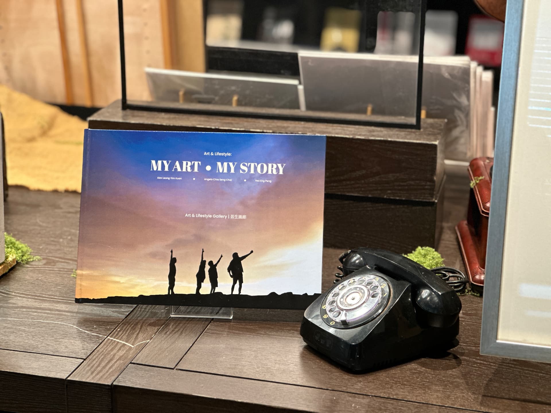MY ART, MY STORY book with a vintage telephone